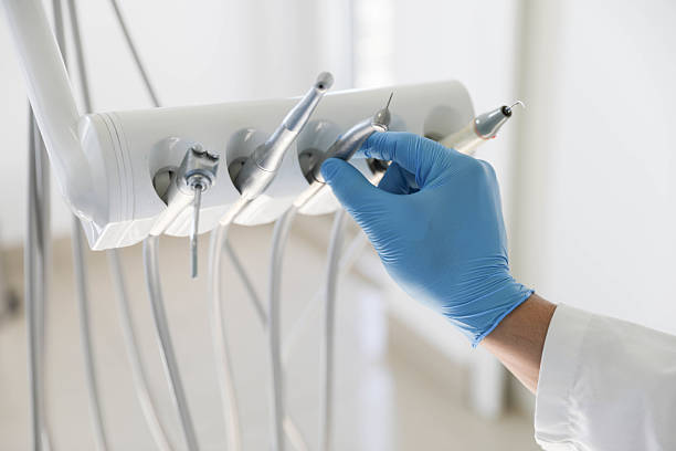 Professional Tooth Extraction technician working in Gates County County, NC